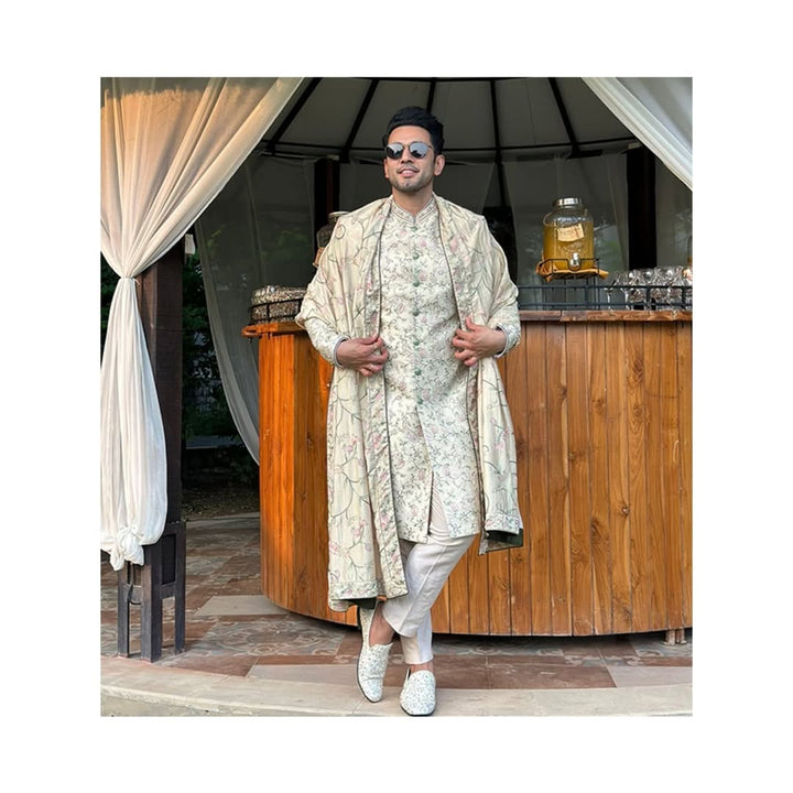 Sahil Anand radiates royal charm in our cream raw silk embroidered sherwani with dupatta and churidar