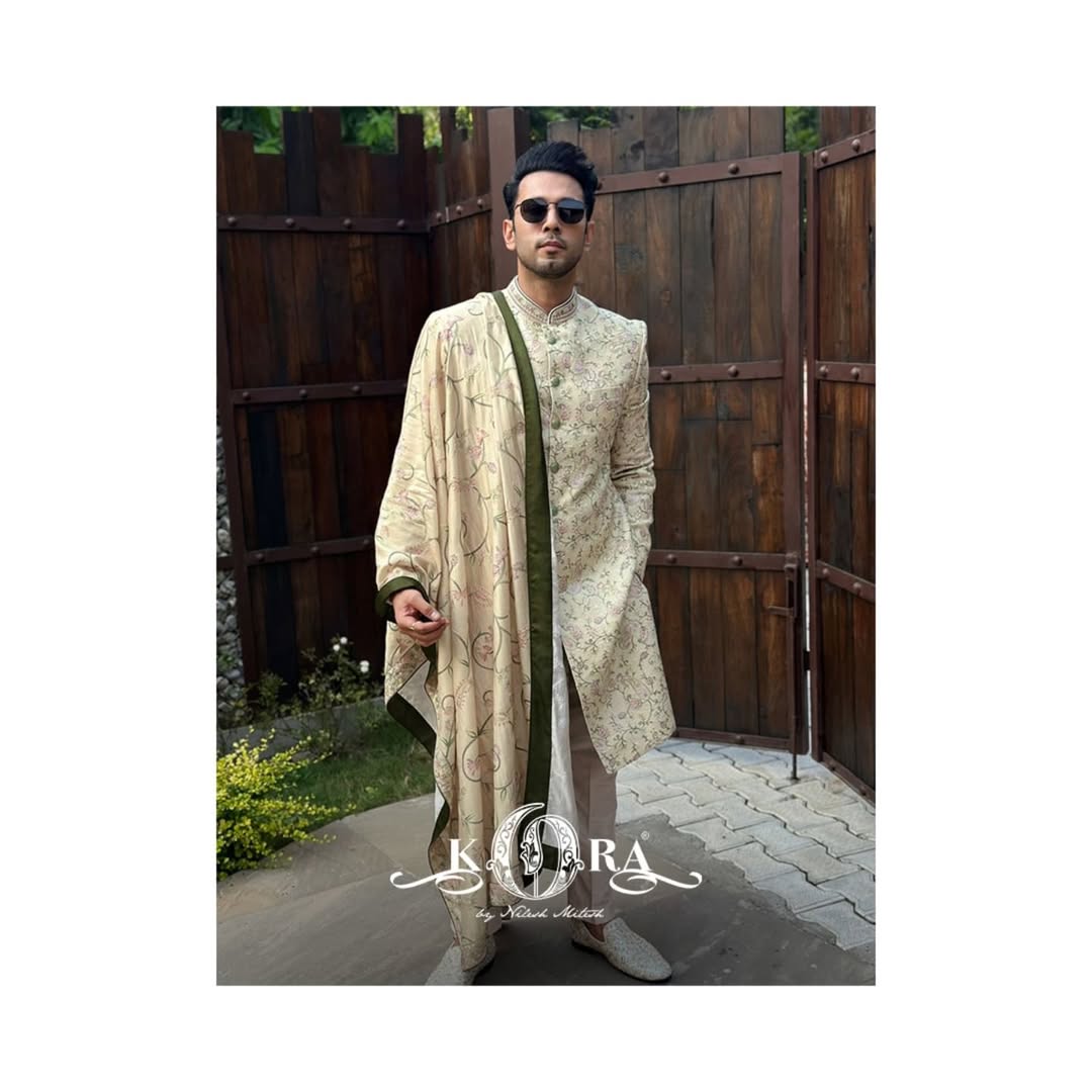 Sahil Anand radiates royal charm in our cream raw silk embroidered sherwani with dupatta and churidar